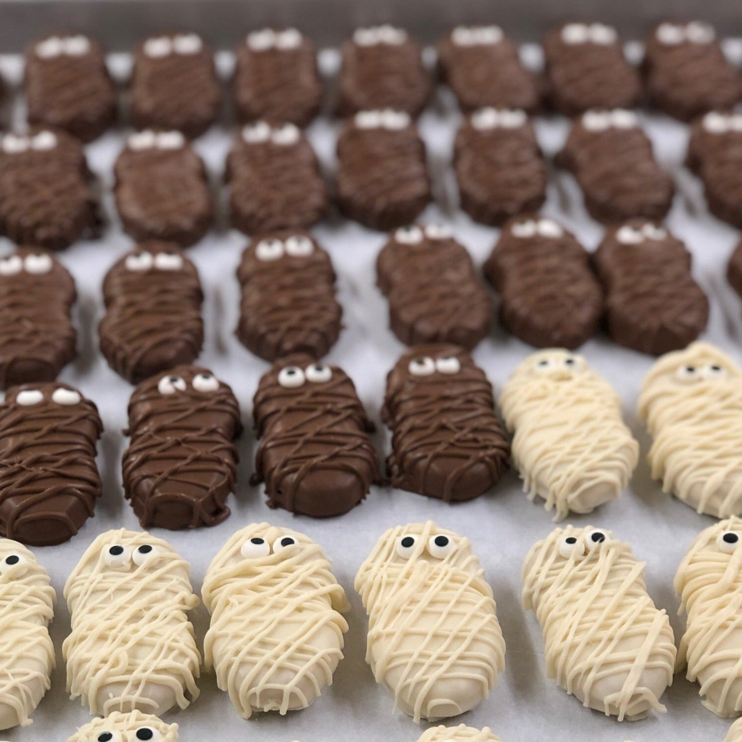 Mummies (peanut butter cookies covered in milk or white chocolate)